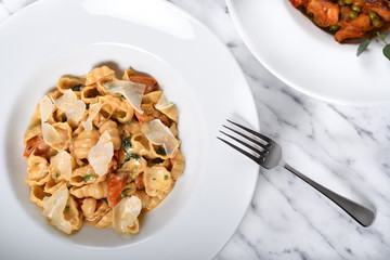 Gnocchi with fresh cherry tomatoes sauce, basil and Parmesan cheese