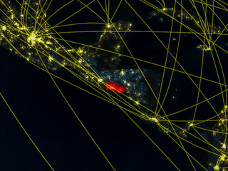 El Salvador from space on model of planet Earth at night with networks. Detailed planet surface with city lights.