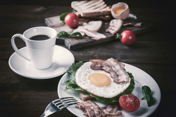 Fried egg and coffee on table