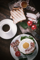 Fried egg and coffee on table