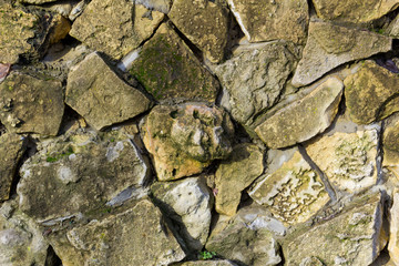 old wall of natural stone 