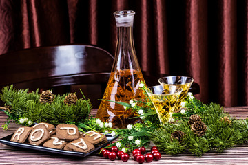 Christmas still life - liqueur, sweet cookies and red currants