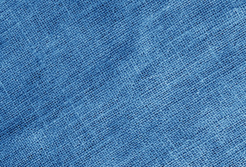 Linen cloth texture in navy blue color.