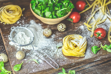 Raw homemade Italian typical pasta linguine noodles