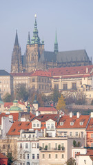 Prague Castle vertical view in misty autumn season, Czech Republic