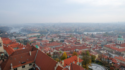 top view of the Prague city with vltava river view in misty autumn