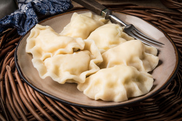 Homemade dumplings with cheese.