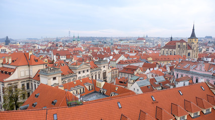 Obraz premium top view of the Prague city from astronomical tower. Layers of red roof building, Czech republic