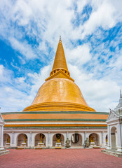 Fototapeta na wymiar Phra Pathom Chedi at Wat Phra Pathommachedi Ratcha Wora Maha Wihan. Translation from left are Song Mueang deity, Suea Mueang deity, Siam Tewa Tirach deity, Indra deity, Thew Ta Phli gate, Brahma god.