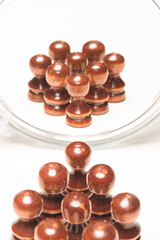 Chess pieces facing mirror. Business and motivational concepts. High resolution image.