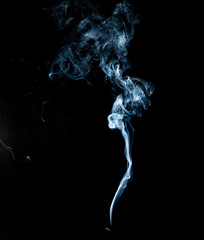 White smoke on black background