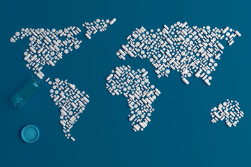 Background of scattered on a plain blue background of many tablets in the form of a silhouette of the continents of the world 3d illustration