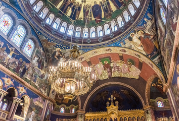 Fototapeta na wymiar SIBIU, ROMANIA, 02 DECEMBER 2017: Beutiful interior with frescos and painting of the Sibiu orthodox cathedral