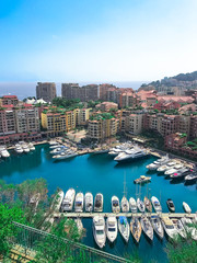 Obraz premium Luxury yacht marina. Port in the Mediterranean Sea overlooking the city of Monaco. Aerial view