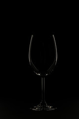 Glass silhouette on black background.