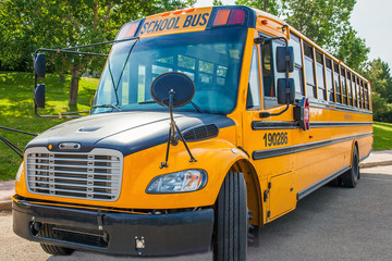 Fototapeta na wymiar Grande Prairie Alberta Canada on June 22, 2018. School bus in Grande Prairie