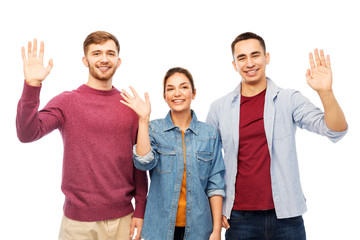friendship and people concept - group of smiling friends over white background