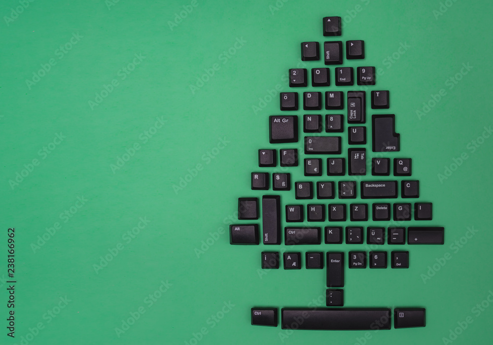 Fototapete christmas tree made of black computer keys with space for text