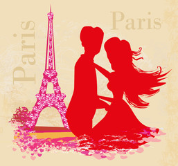 Fototapeta na wymiar Sweet couple in Paris near the Eiffel tower.