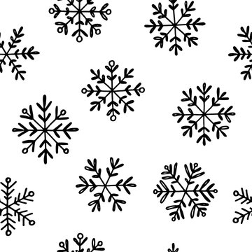 Christmas hand drawn seamless vector pattern with snowflakes