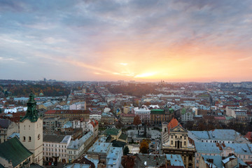 Panoramic cityscape view on roofs,center and domes of Lviv city, Ukraine on sunset