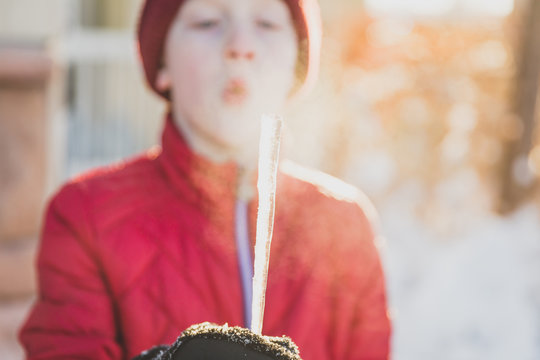 Boy With Icecicle, Boy in Cold Weather, Kid With Icecicle