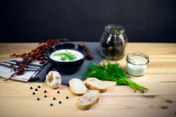 Fresh bread with lard and pickled cucumbers