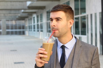 Cheerful businessman during coffee break