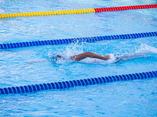 Young man in the swimming.