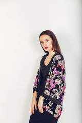 Young and beautiful girl in a studio