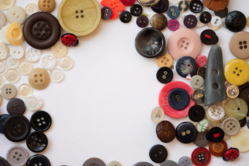 Collection of buttons arranged in a circle frame with space for text