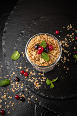 Сhia pudding or yogurt with granola, mango or peach. Healthy breakfast concept and idea. Detox and healthy superfoods.