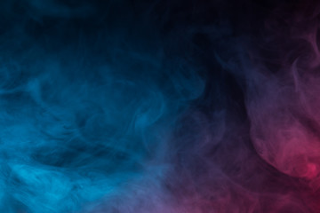 Colorful smoke close-up on a black background