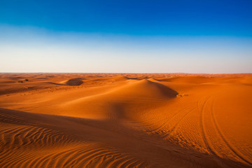 Fototapeta na wymiar desert sand and dunes with clear blue sky. Asia