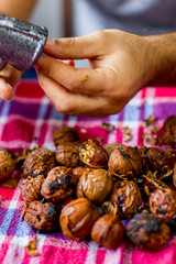 Hands inject walnut