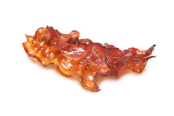 Fried bacon rashers isolated on white background.