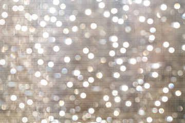 Glitter sparkling abstract silver bokeh defocused background