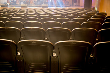 Fototapeta premium Empty comfortable chairs seats with numbers in hall