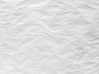 Vintage background form dirty crumpled white paper.