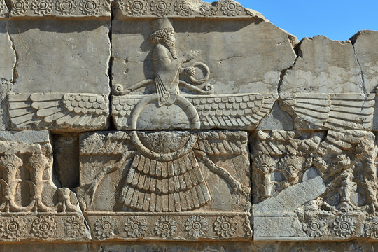 The beautiful reliefs - symbols of Zoroastrian in the ruins of Ancient Persepolis Complex of Near Eastern civilisation with persian architecture, Pars - Iran