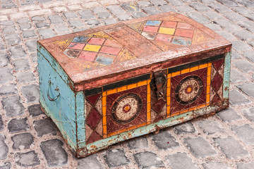 Ancient Oriental chest for storing clothes and fabrics. Ornament and pattern in Oriental style....