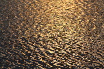 Waves texture in the sunset