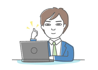 パソコンで仕事中にいいねのポーズをする男性