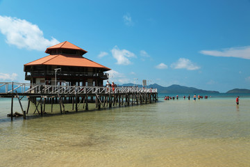 People near pier on Koh Wai island, Thailand