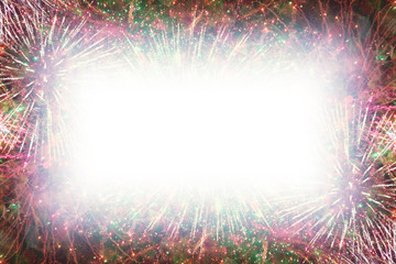 Colorful fireworks with white rectangle soft glowing edges copy space in the middle