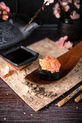 Spicy salmon gunkan. Sushi menu. Japanese food.