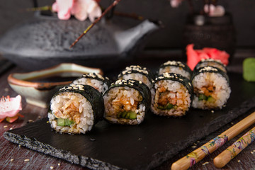 Maki rolls with cucumber and unagi sauce. Sushi menu. Japanese food. 