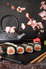 Maki rolls with salmon and cheese. Sushi menu. Japanese food. 