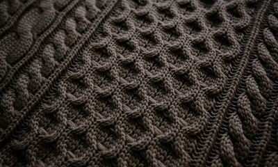Knitted plaid large knitting. Textural background.
