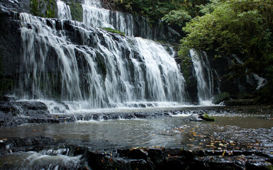 Purakaunui Falls from a distance in the Catlins in the South Island in New Zealand
